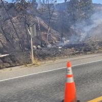 Evacuees allowed home after vehicle fire sparks blaze along Highway 97