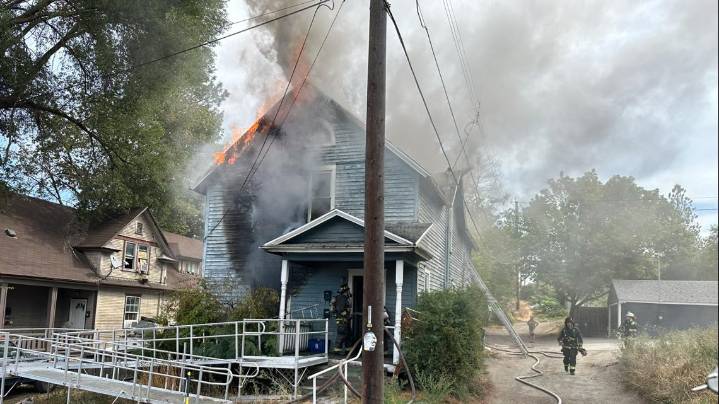 Man in critical condition after being rescued from house fire on Spokane's lower South Hill