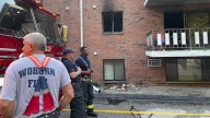Residents rescue bedridden woman from burning apartment building