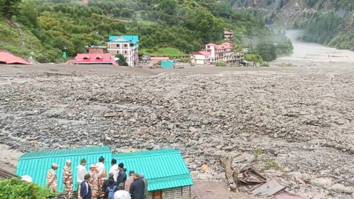 India flash floods: Dozens believed to be trapped under rubble as at least 11 soldiers reported missing