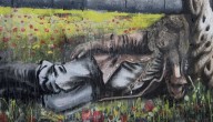 Woman suspected of vandalizing Palestinian mural charged with hate crime, battery