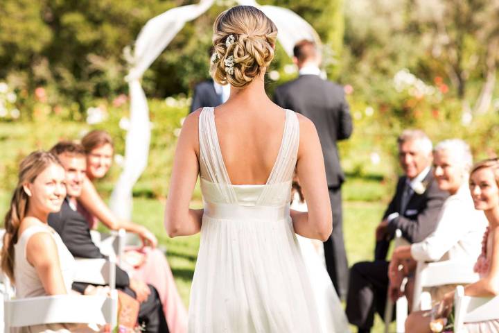 Bride Makes Unforgettable Entrance as She Nearly Takes a Tumble Down the Aisle at Wedding