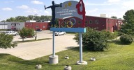 Years after abuse reports, ex-coach at renowned US gymnastics academy is arrested by FBI