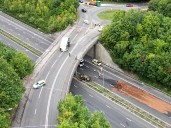 M20 closed after tractor falls off bridge and onto central reservation