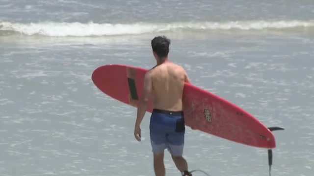 High tides, rough surf hit Florida as Hurricane Erin churns