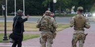 Some Guard units in Washington are now carrying firearms, Pentagon says. Trump targets more cities