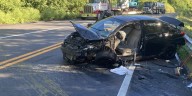 Rescue crews rescue trapped motorist from car accident