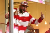 Travis Kelce Goes Head-to-Toe Red in First Newly Engaged Outing with Taylor Swift