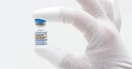 FDA approves updated COVID-19 shots but limits access for some kids and adults