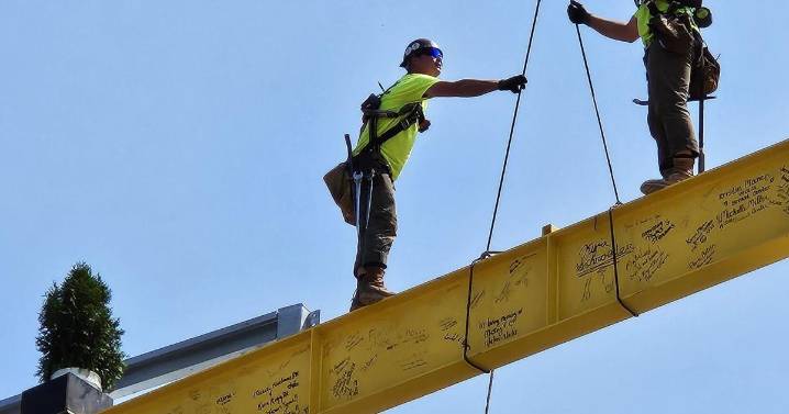 Franciscan Health places final beam in new Dean and Barbara White Cancer Center