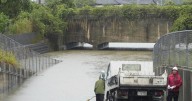 Torrential rains in southern Japan cause flooding, mudslides and travel disruptions