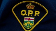 Woman dead after single-vehicle rollover on Highway 401 ramp in Brampton, police say