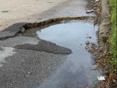 Breaking down how to file a claim if a Houston pothole damages your car