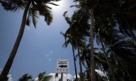 Buscan a surfista arrastrado por corrientes en playa de Dorado