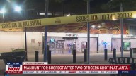 Manhunt underway after 2 officers shot in Atlanta