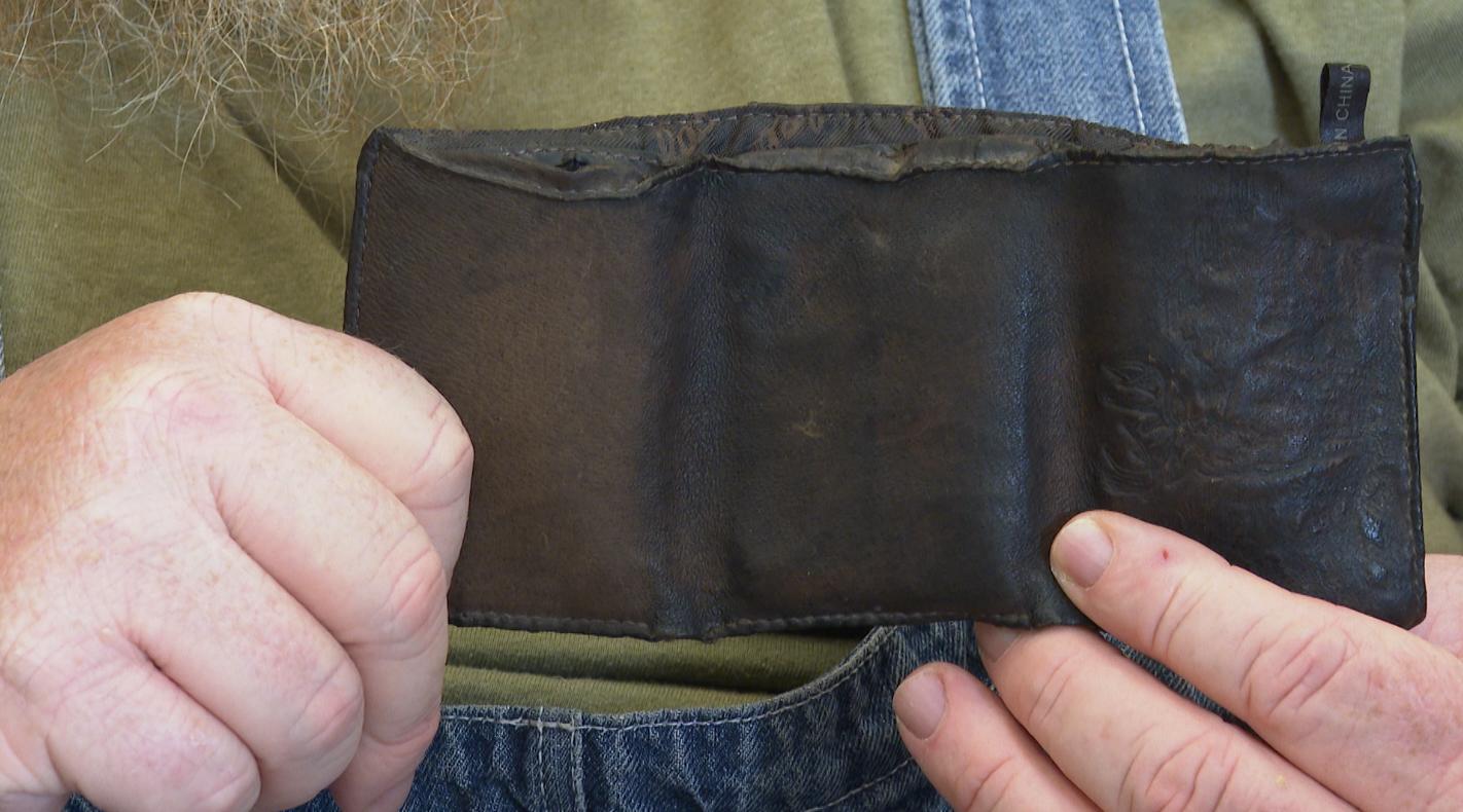 A Michigan autoworker's wallet is found under a hood in Minnesota