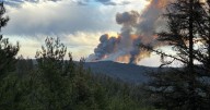 Evacuation orders downgraded for parts of Windy Rock Fire zone