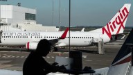 Virgin Australia passengers forced to use bottles as all three toilets break down on Bali to Brisbane flight