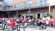 Husker fans create sea of red at Railyard watch party, giving bars a big boost