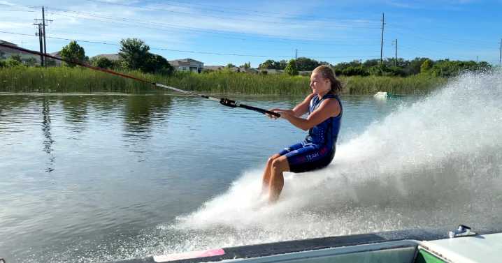 Experts teach families how to barefoot water ski in Winter Haven