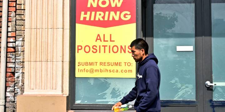 U.S. unemployment claims surge to nearly 2 million, the most in almost 4 years
