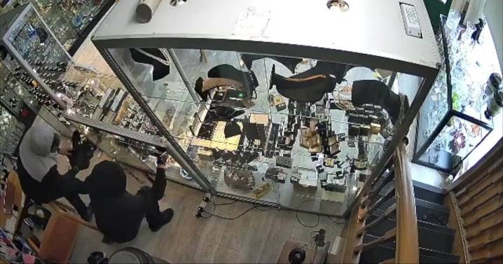 Horror moment jewellery shop thieves tie up young woman and threaten to kill her