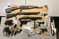 Deputies seize cocaine, 8 guns, knives in Syracuse raid; two people charged
