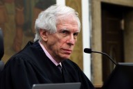Appeals court throws out massive civil fraud penalty against President Donald Trump