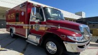 Pedestrian hospitalized after being hit by Orange County ambulance