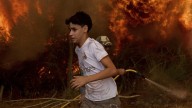 Spain battles record wildfires even as the end of a heat wave brings lower temperatures