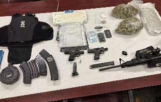 Columbus Man Arrested in Shooting; Guns and Drugs Seized in Raid