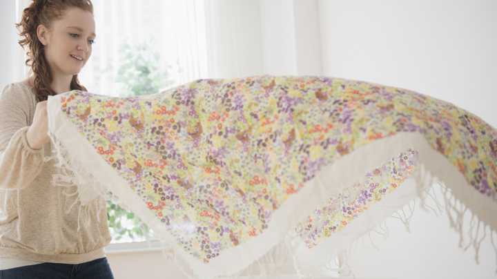 Upholster A Bedframe With Your Favorite Tablecloth Using A Simple DIY