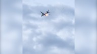 Watch: Plane makes emergency landing after flames shoot from engine