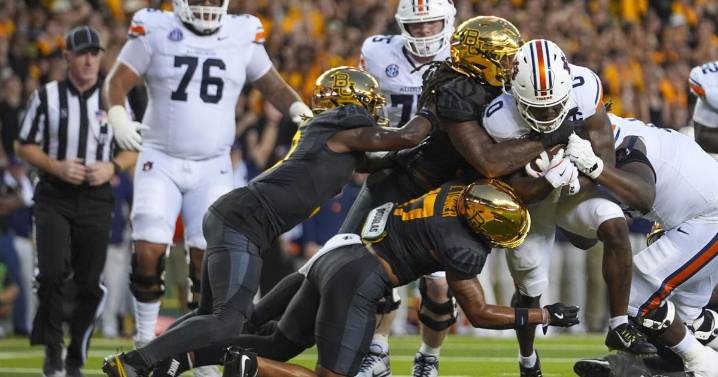 QB Jackson Arnold runs for 137 yards and 2 TDs in Auburn debut for a 38