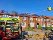 Fire spreads along row of homes in huge blaze in north London