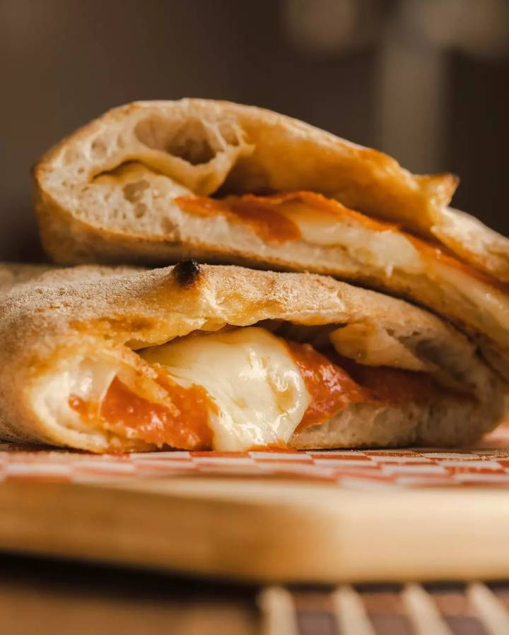 Pizza Lovers Are Raving About Albano's Massive Pizza Puff