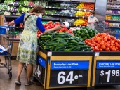 Walmart scoops customers from rivals but warns inventory cost is rising