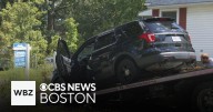 Randolph police crash while searching for robber who held up cashier at gunpoint