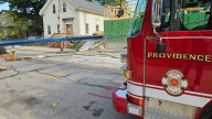 Crane falls across street in Providence