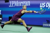 Still sporting his accidental buzz cut, Carlos Alcaraz wins easily at the US Open