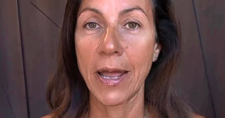 Topless Julia Bradbury films breast implants and issues 'life