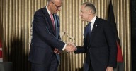 Carney says he will travel to Germany next week to deepen ties