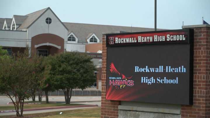 Caregiver arrested after baby found dead in car at Rockwall Heath High School