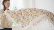 Upholster A Bedframe With Your Favorite Tablecloth Using A Simple DIY