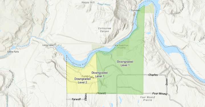 Evacuations lowered for Crescent Road wildfire near border of Lincoln and Spokane County