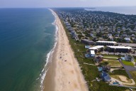 Hurricane Erin's massive waves threaten to isolate North Carolina's Outer Banks