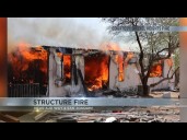 Structure fire near Ajo and San Joaquin caused road closure