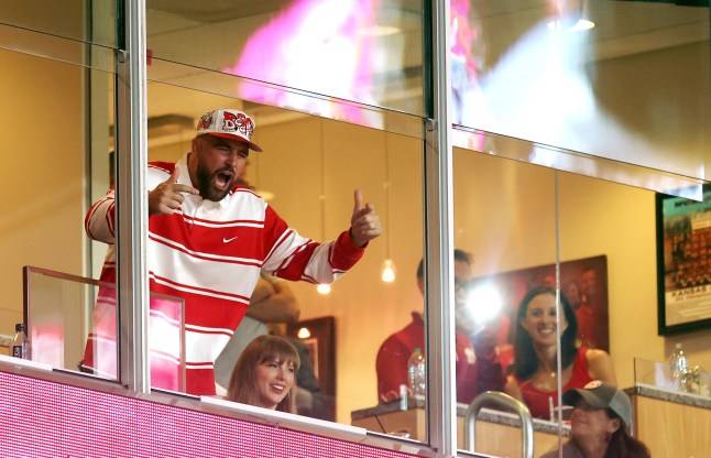 Taylor Swift and Travis Kelce appear loved up in first public appearance after engagement