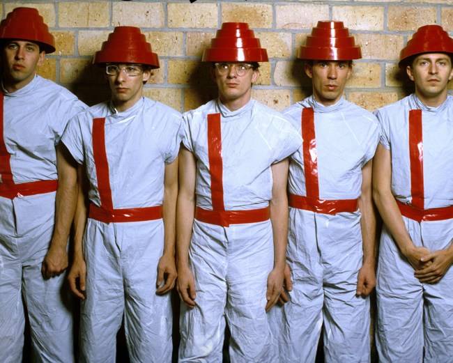 Devo talk new Netflix doc, banned MTV video, and 50 years of being ‘the most understood band in the world’