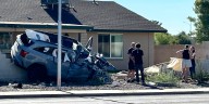 Mesa main road closed after vehicle crashes into wall